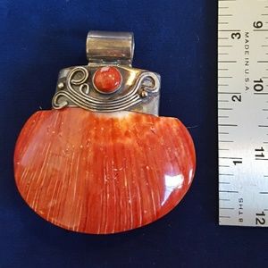Orange Shell attached to 925 Sterling